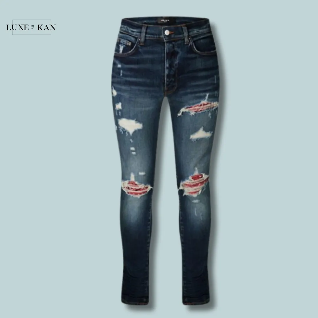AMIRI
MX-1 DISTRESSED JEANS
