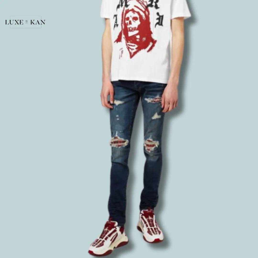 AMIRI
MX-1 DISTRESSED JEANS