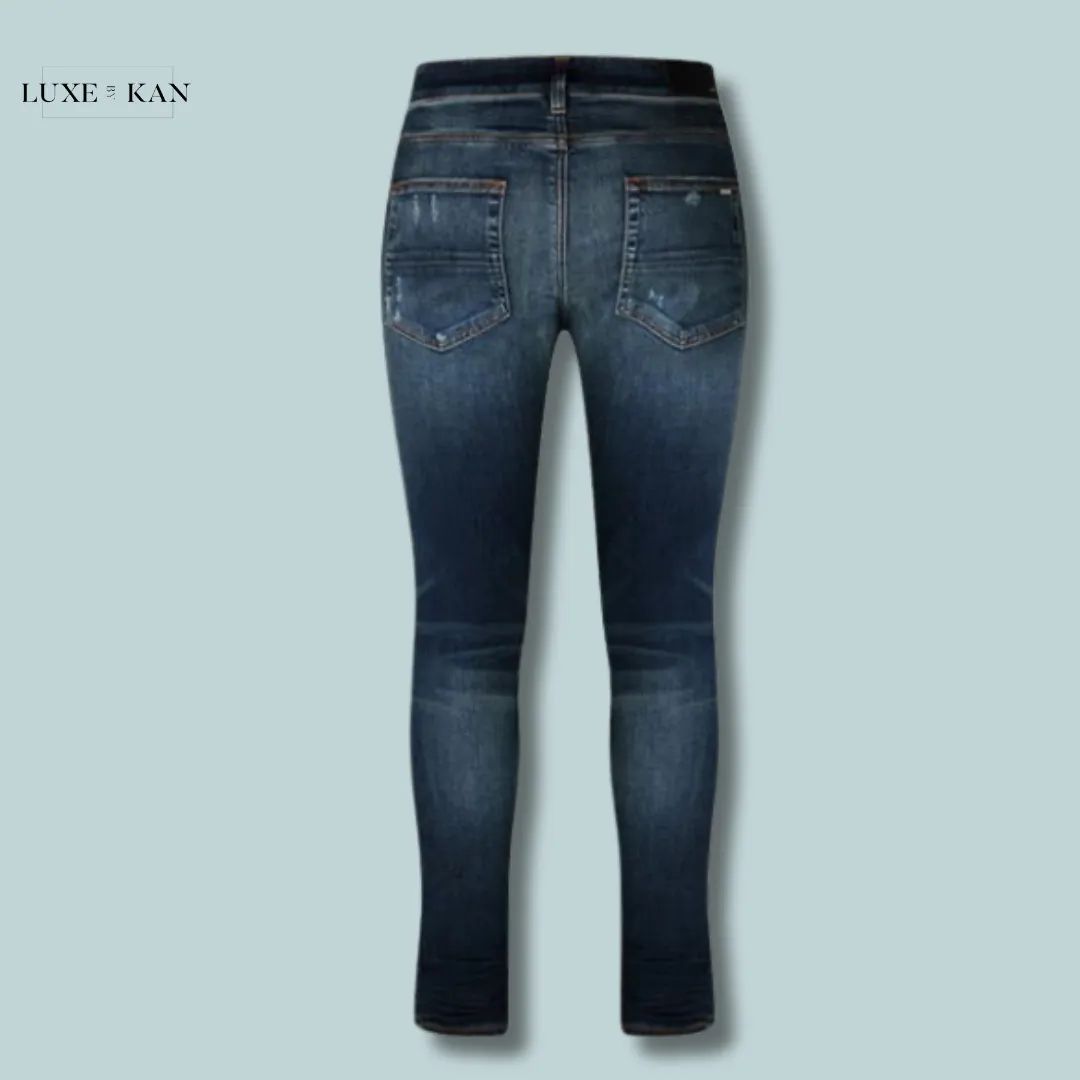 AMIRI
MX-1 DISTRESSED JEANS