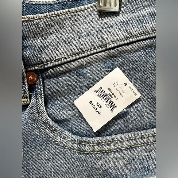 Gap Mid Rise Girlfriend Jeans distressed by manufacturer rips raw hem 29 NWT