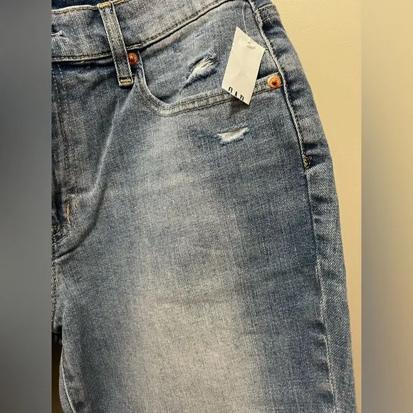 Gap Mid Rise Girlfriend Jeans distressed by manufacturer rips raw hem 29 NWT