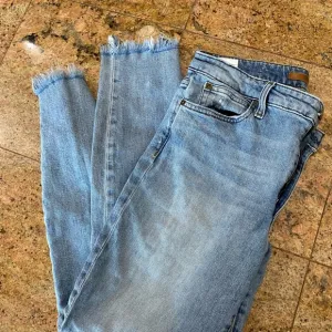 Joe’s jeans the Charlie high rise skinny ankle jeans