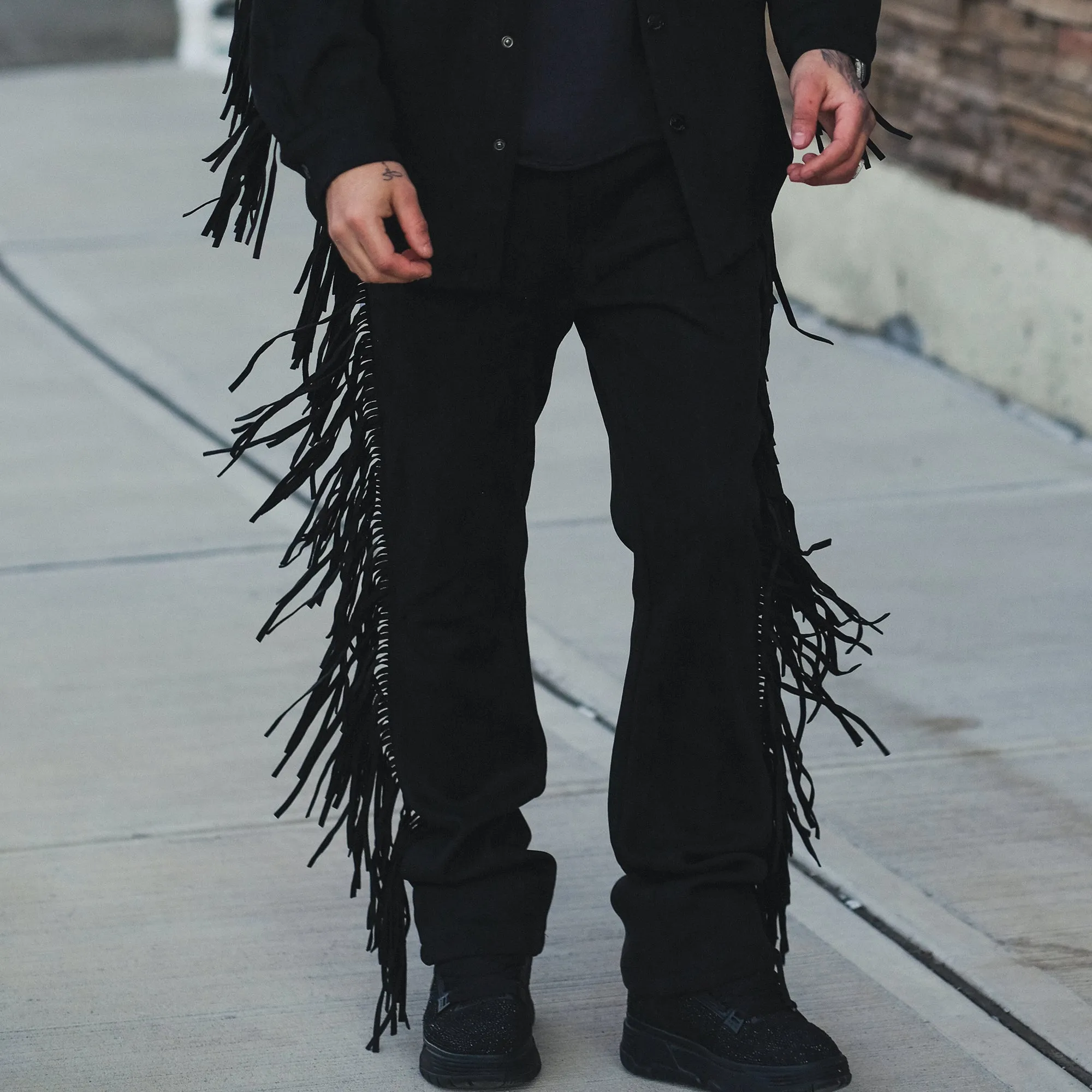 Suede fringed flared jeans
